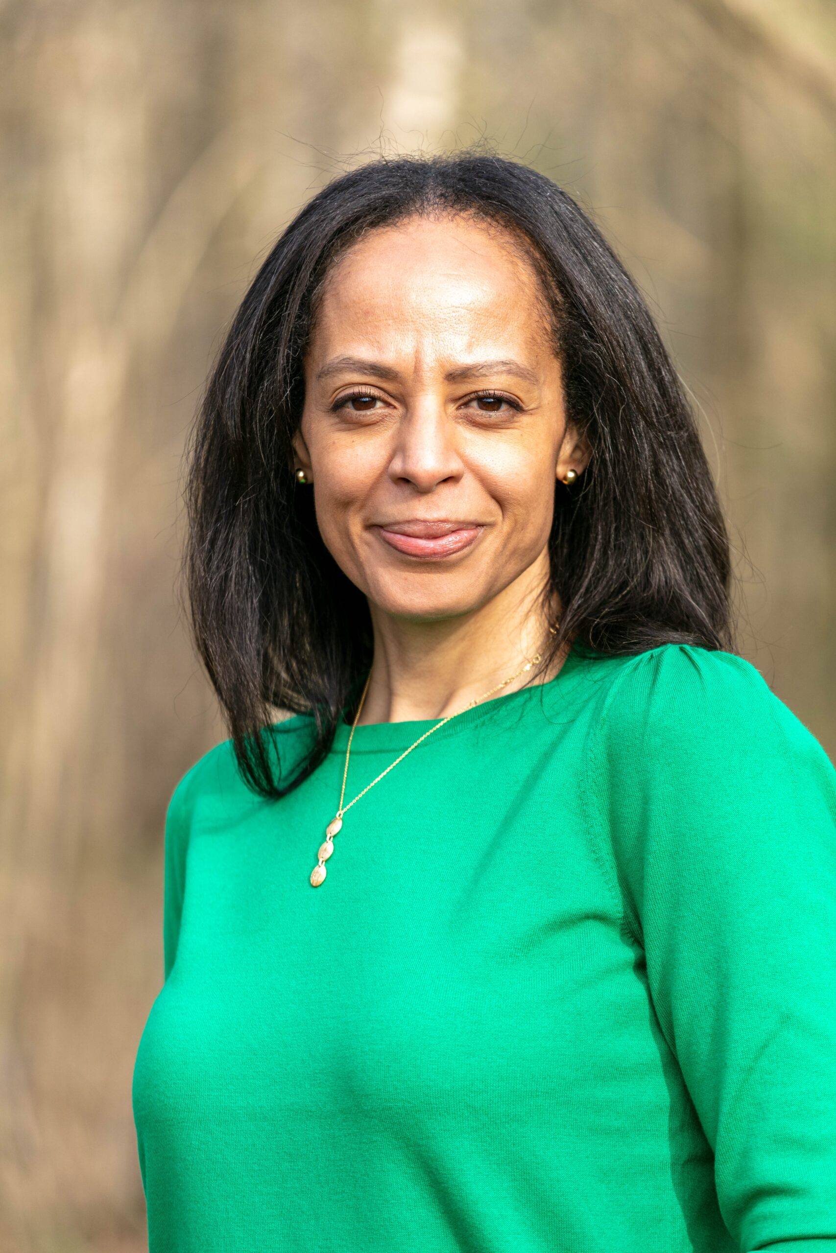 An image of Rachel Osikoya smiling at the camera.